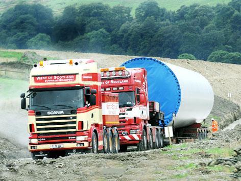 It’s an uphill task as lorries wind their way over narrow roads to Coal Clough windfarm