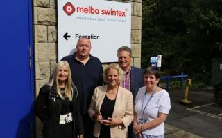 Council chiefs and Melba Swintex officials celebrate the anticipated move to Stubbins