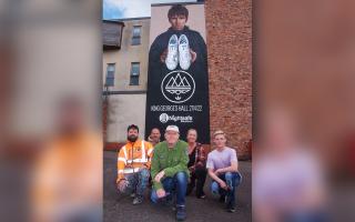Gary Aspden, centre, with, from left, artists Peter Barker and Gary Watson, Nightsafe operations manager Nicola Roscoe, and service user Cole Hughes, in front of the mural