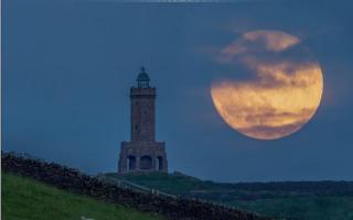 The strawberry supermoon over Darwen Tower (Photo: Lee Mansfield)
