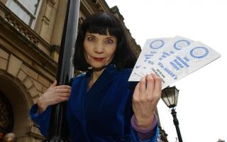 Mystic Meg with the lottery tickets for the new East Lancashire Hospice Lottery in 2003
