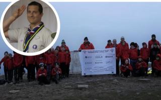 Members of St Mary Magdalene Scout Group climbed Pendle Hill at 4am for a fundraiser. Inset is Bear Grylls