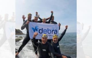 Former Blackburn Rovers manager Graeme Souness (bottom right) completed a charity swim in aid of Debra UK