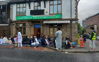 Worshippers at the Darussalam Education Centre  in Blackburn