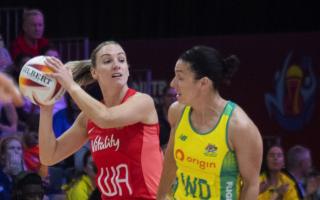 England co-captain, Barrowford's Nat Metcalf in action during the 2023 Netball World Cup final against Australia