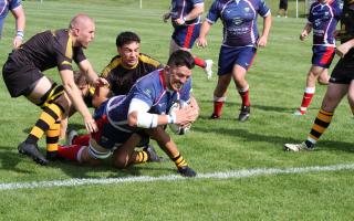 Josh Malkinson dives over to score Blackburn's opening try of the game against Nantwich at Ramsgreave Drive
