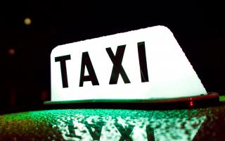 Stock image of taxi sign
