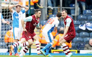 Dean Marney and Danny Ings celebrate Burnley’s derby win