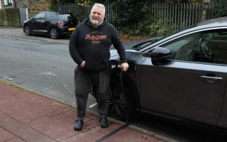 Mike Pickering believes the convenience and financial benefits of charging on his own street have given him more freedom to use his car