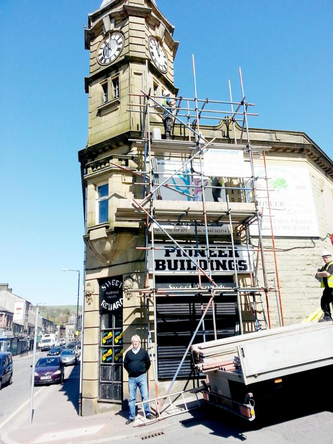 FACELIFT: Workmen begin restoration of the Pioneer Building, in Rochdale Road, Bacup as part of a £2 million scheme