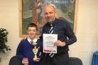 Dylan Walden recieving his award for 100 per cent attendance